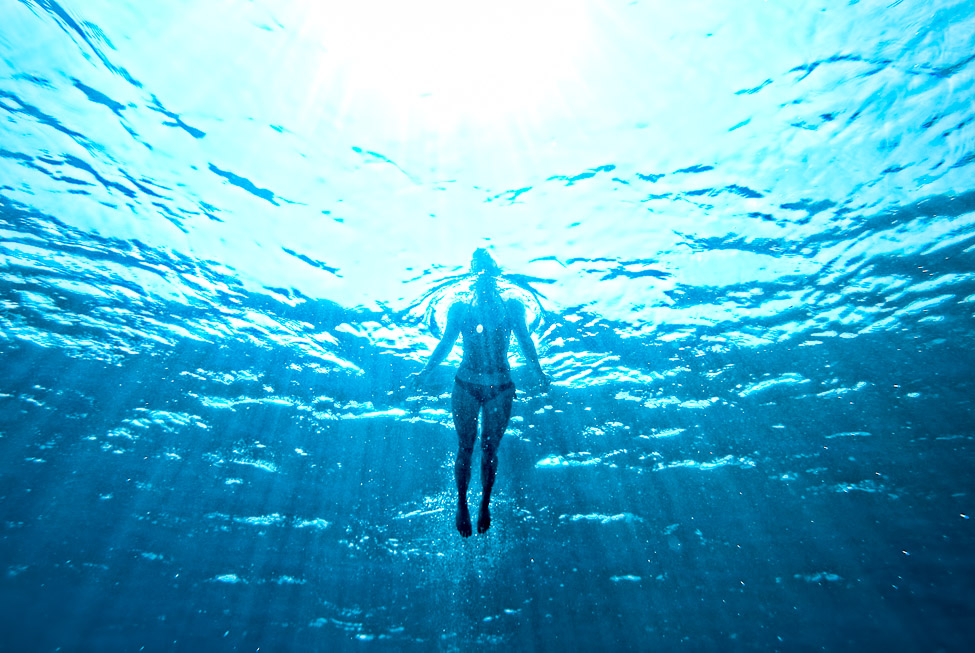 swimming underwater - woman